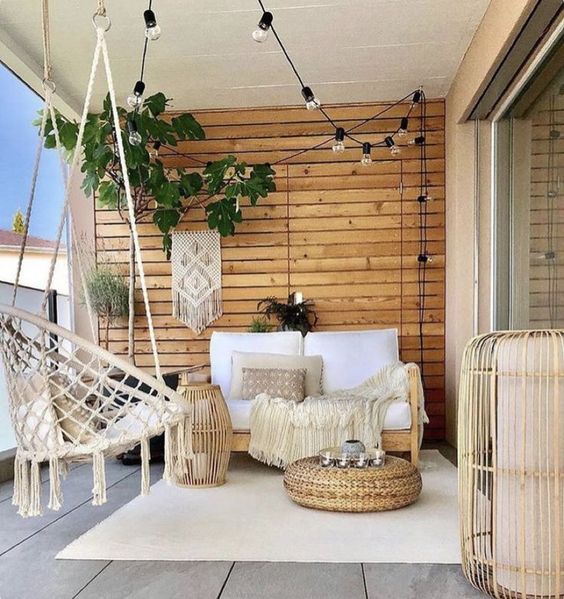 Boho Patio Furniture Ideas; Macrame swing.The bohemian patio furniture ideas in this post include eclectic patio chairs, wicker or rattan furniture, wall decor with rustic appeal, and even boho metal planters for your garden!