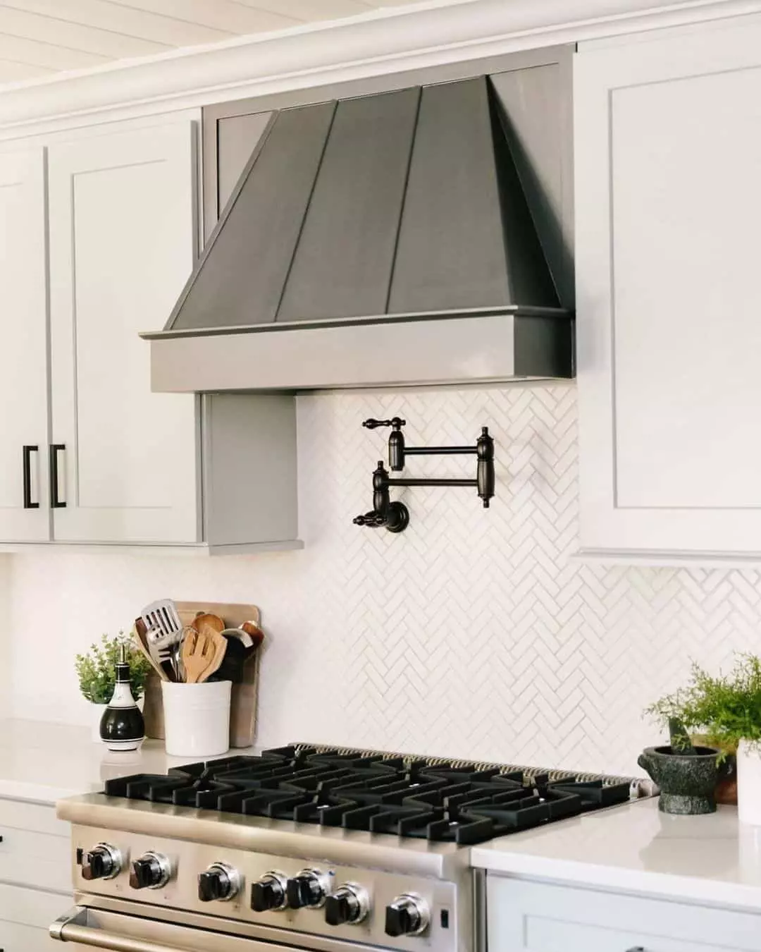White Herringbone Backsplash Tile Ideas; Modern white herringbone tile ideas. Minimalistic and geometric tiles for your kitchen backsplash!