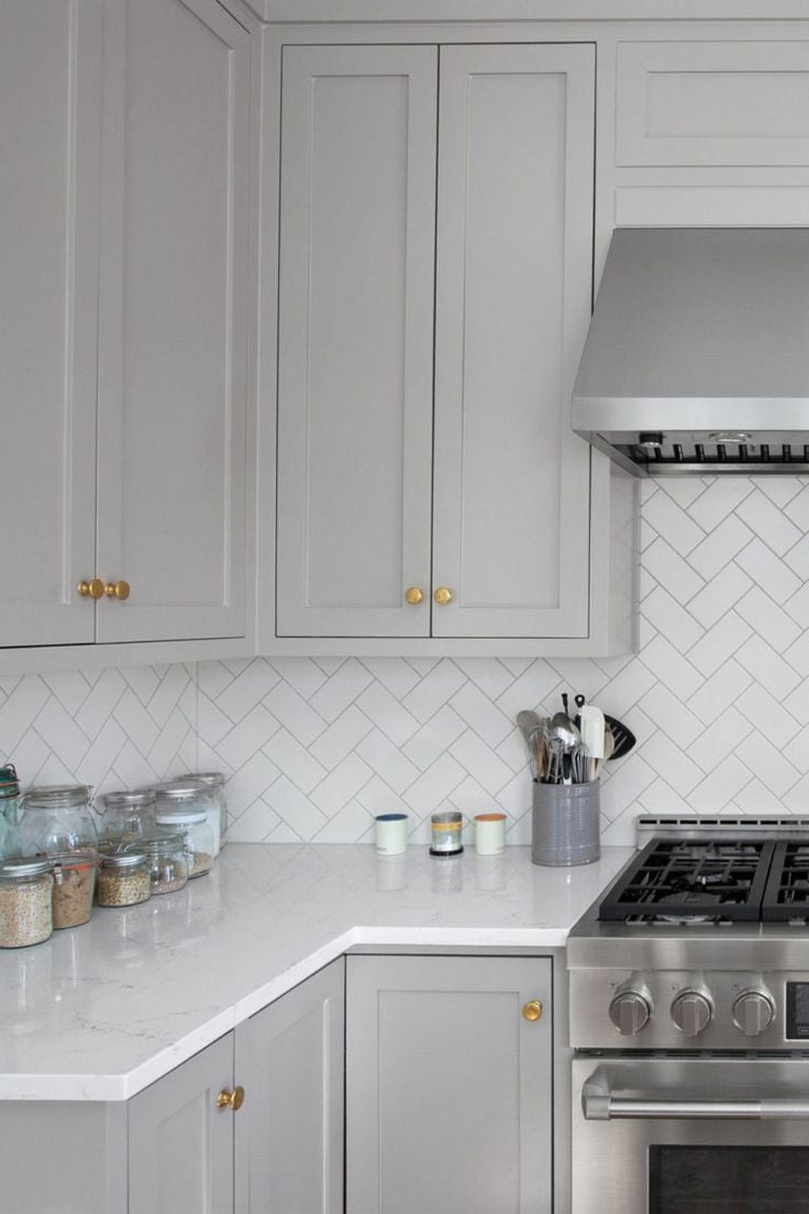 White glossy porcelain tile is perfect for kitchen backsplash. This tile's braided herringbone motif adds a touch of luxury to the room and will go great in any modern, sophisticated kitchen.