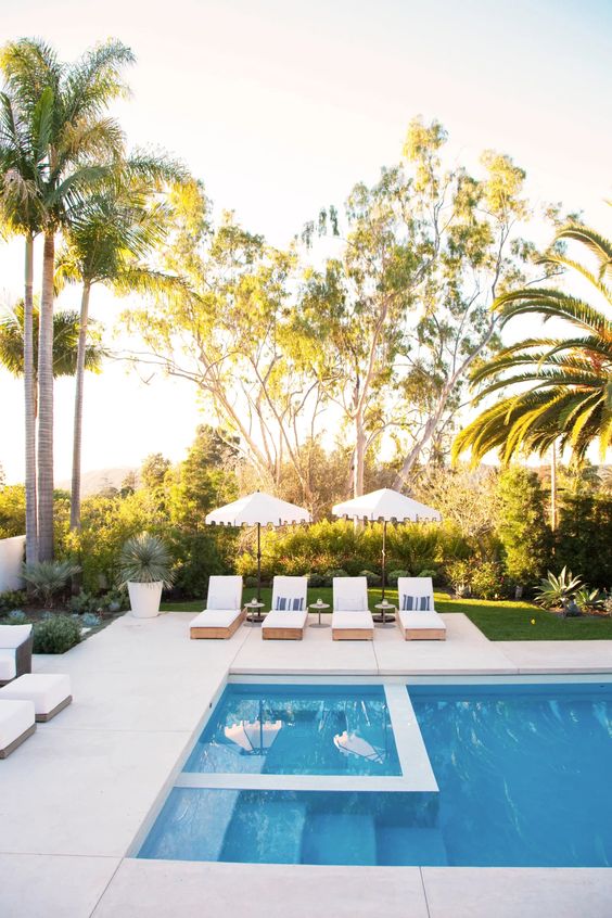 How to Create a Beautiful Backyard Pool Oasis; tips for building beautiful backyard swimming pool designs and with ideas.