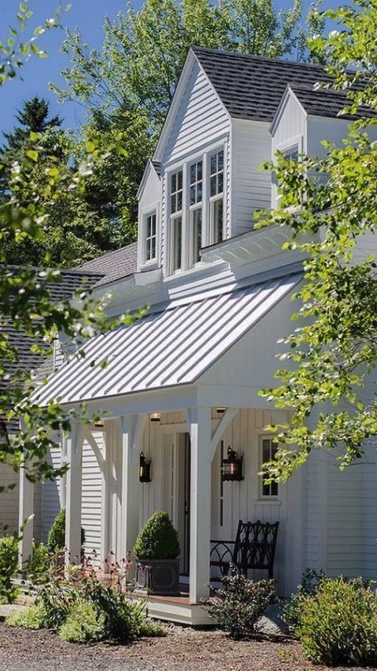 Modern Farmhouse exterior design blends the modern lines of a contemporary home with the warmth and rustic charm of an old-fashioned farmhouse. Here is everything you need to know!