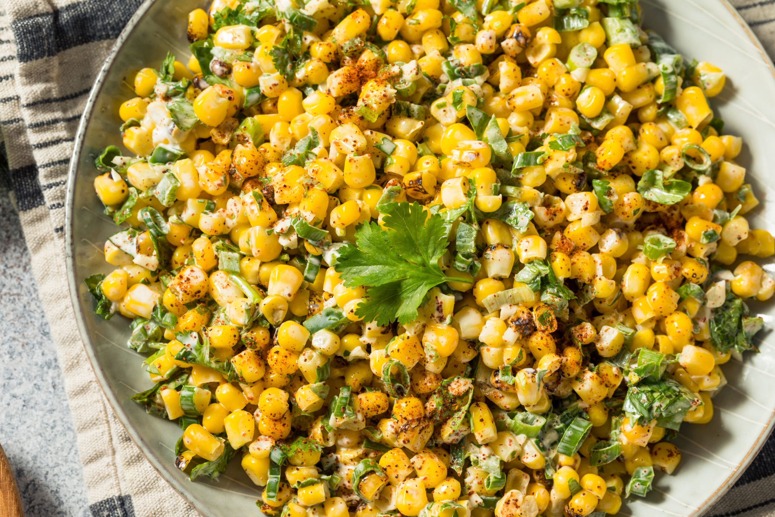 Mexican Street Corn Salad Recipe (Esquites with Lime); Looking for a tangy and flavorful salad recipe? Try my Mexican Street Corn Salad (Esquites) with Lime! This twist on a classic Mexican street food features charred corn kernels tossed in a creamy and zesty dressing. Perfect as a side dish or a standalone vegetarian option. Get the recipe now!