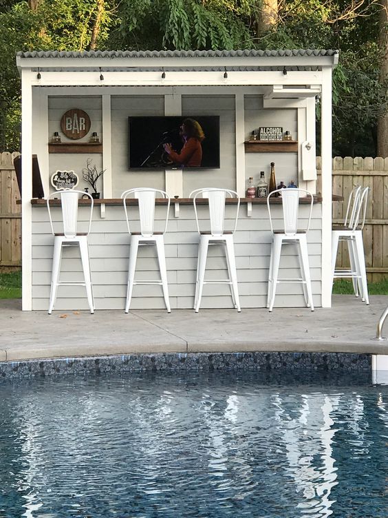 40+ Pool Bar Ideas Your Backyard NEEDS! Here are backyard pool bar ideas for your next pool renovation. Swim-up bars that will impress all your guests!