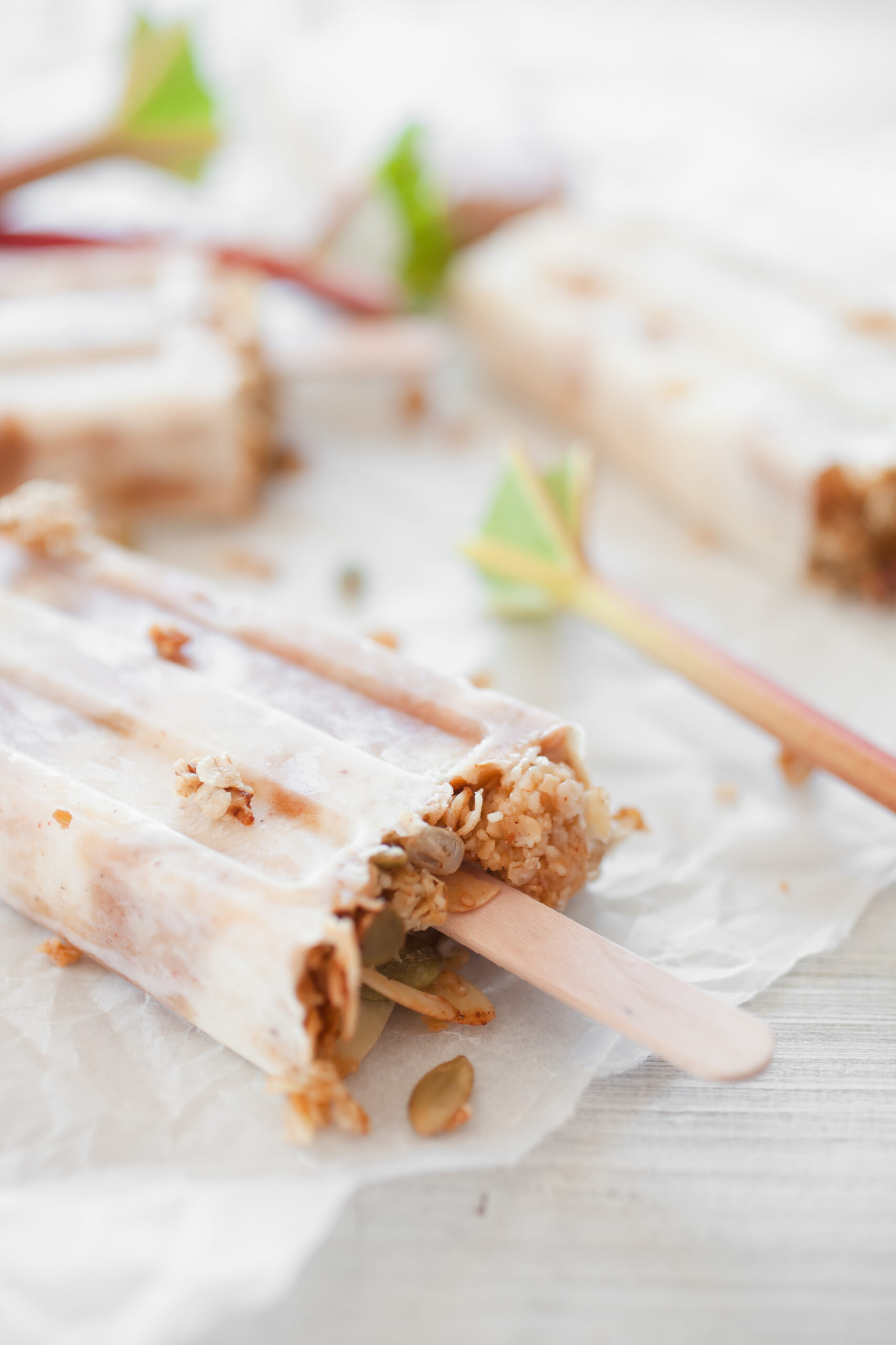 Rhubarb Yogurt Popsicles with Granola Recipe; This delicious recipe combines tangy rhubarb with creamy Greek yogurt, creating refreshing popsicles that are perfect for summertime. With the addition of crunchy granola, these popsicles provide a delightful texture that will leave you craving for more. Try this easy and healthy recipe today!