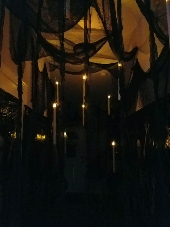 Haunted Hallway with floating candles for Halloween decor ideas