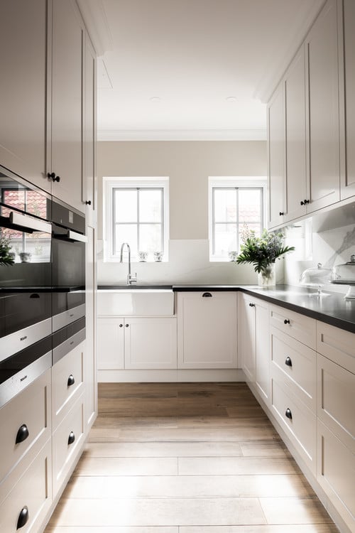 White Cabinets Black Countertops Kitchen Ideas - Cottage Kitchen With White Cabinets And Black  Countertop