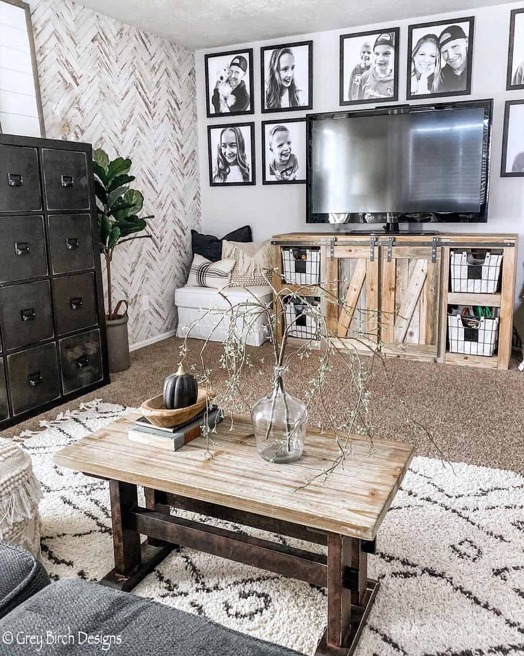 farmhouse TV stand ideas; A rustic charm with this barnwood TV stand, featuring sliding barn doors that add a touch of authenticity and character to any living space. The weathered texture and natural tones of the barnwood evoke a sense of warmth and nostalgia, making it a perfect fit for farmhouse or rustic-inspired decor. Embrace the charm of a bygone era with this captivating piece that seamlessly combines functionality with vintage style.