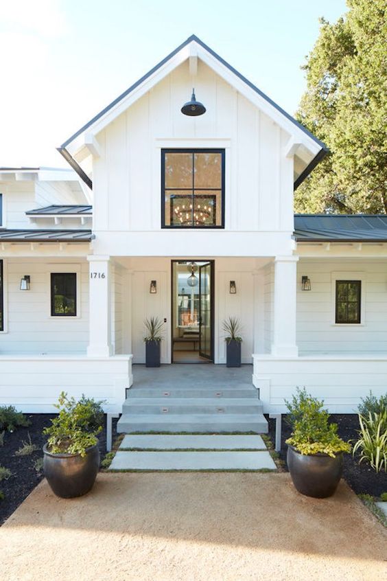 Discover the most stunning white farmhouse exteriors that will inspire your next home renovation project. From charming country cottages to grand manor houses, explore my curated list of the top 25 white farmhouse exteriors that you absolutely need to see. Find your dream style and get inspired to create a timeless, elegant, and inviting home!!
