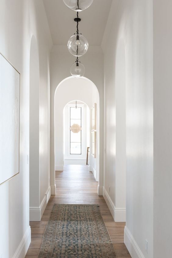 Discover the power of proper hallway lighting in this comprehensive guide, with tips on choosing the best fixtures, achieving a balanced layout, and enhancing your home's aesthetic. Brighten your space today!
