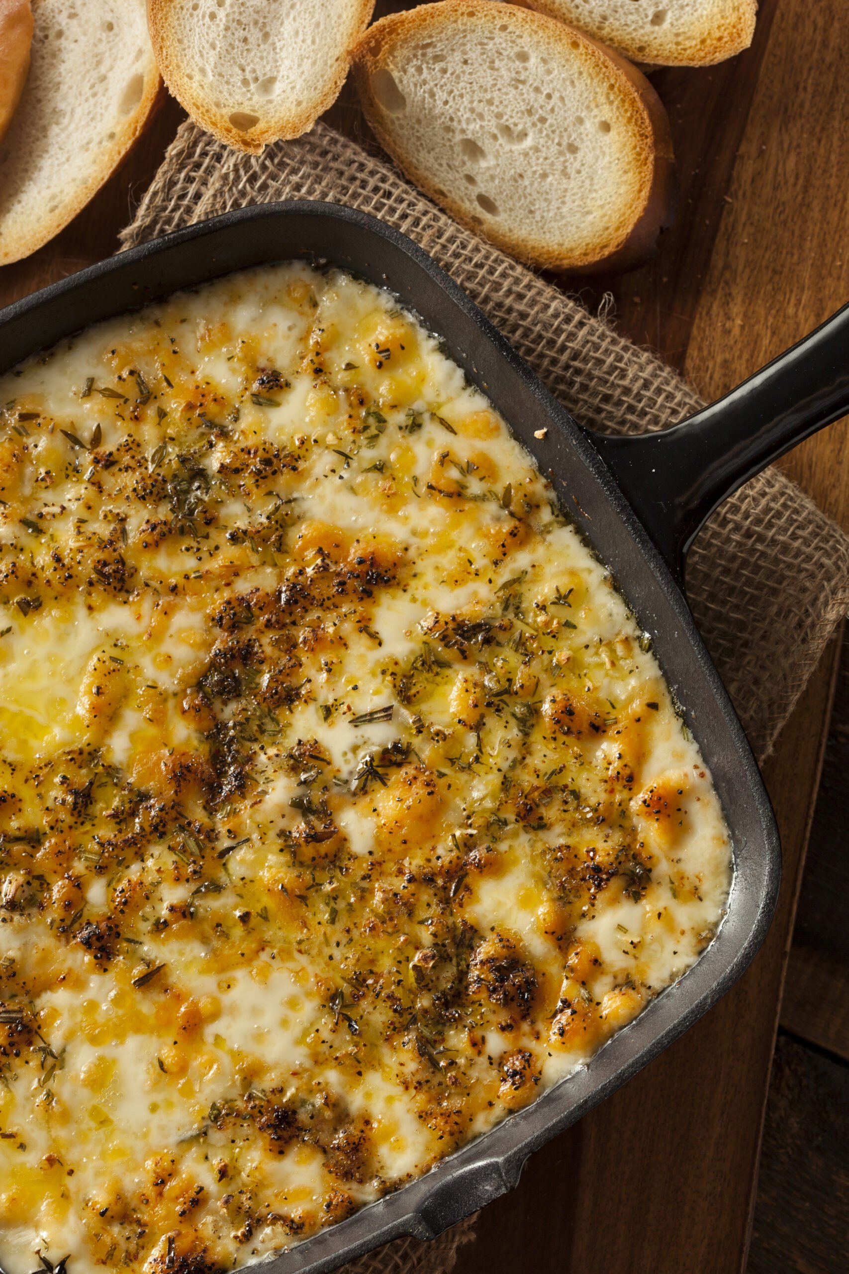 Baked Fontina Cheese Dip - an unforgettable Italian inspired appetizer recipe. Perfectly melted Fontina cheese, seasoned with aromatic herbs, served hot and delicious. Party-perfect, easy to make, and irresistibly creamy!