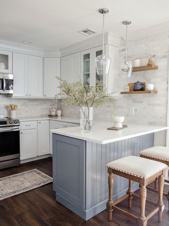 How to Design a Small Kitchen: Small kitchen, U-shaped kitchen, marble subway tile, light blue and white
