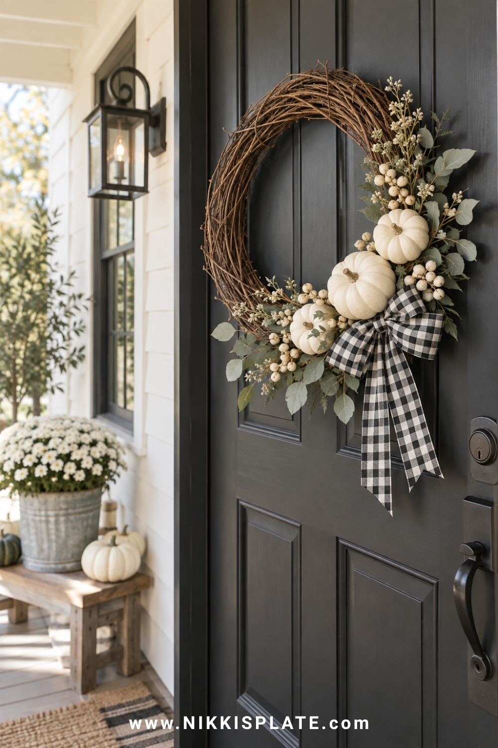 Farmhouse grapevine wreath with white pumpkins, cream berries, eucalyptus and gingham ribbon