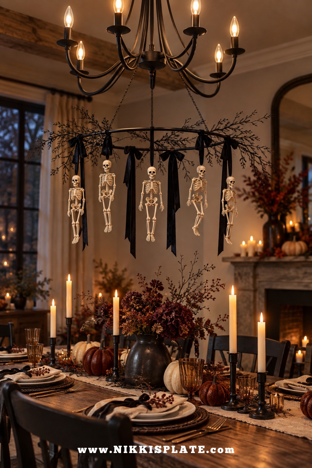 Lightweight mini skeleton chandelier hanging above a styled farmhouse Halloween dining table