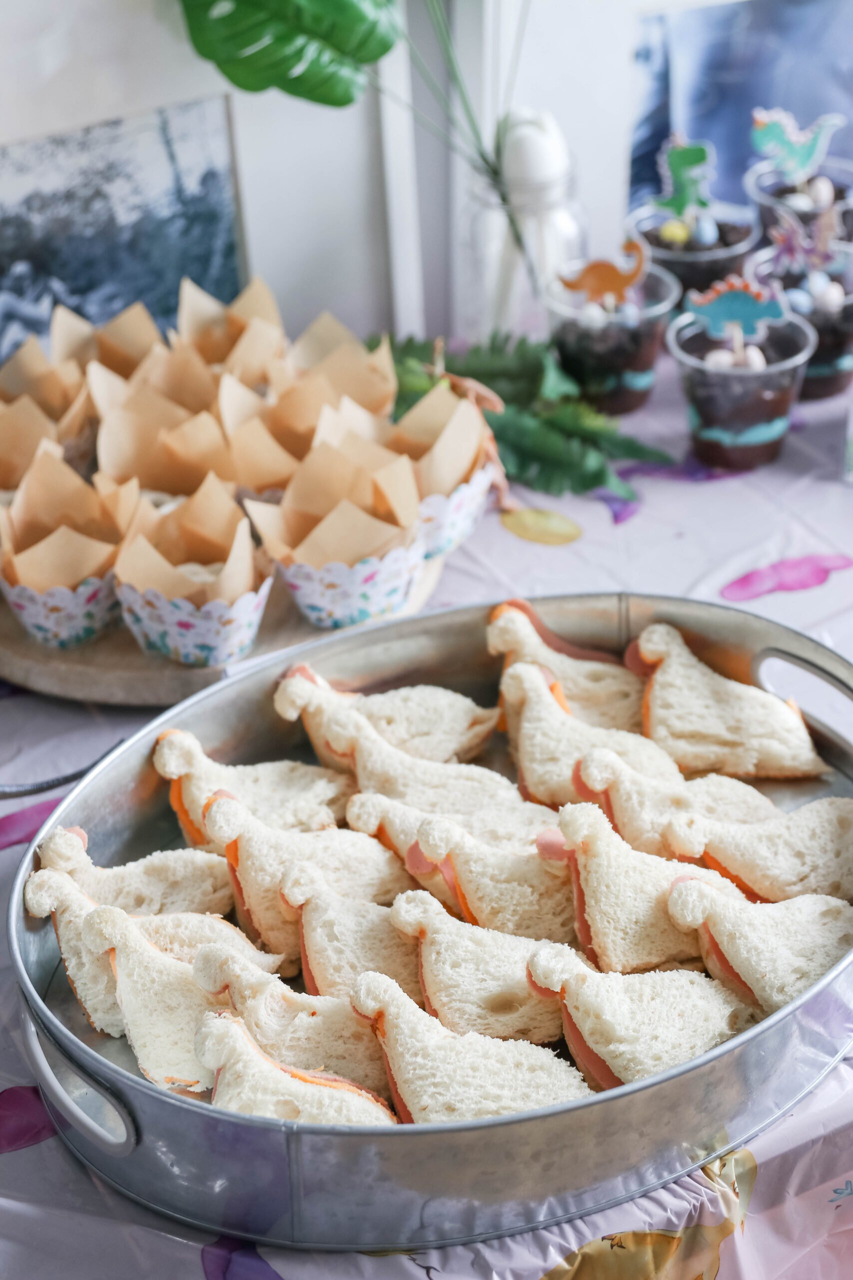 Step into a cute dino adventure with our 4 year old daughter's dinosaur themed birthday party! Here are creative ideas for decorations, games, and treats that made her day truly prehistoric!