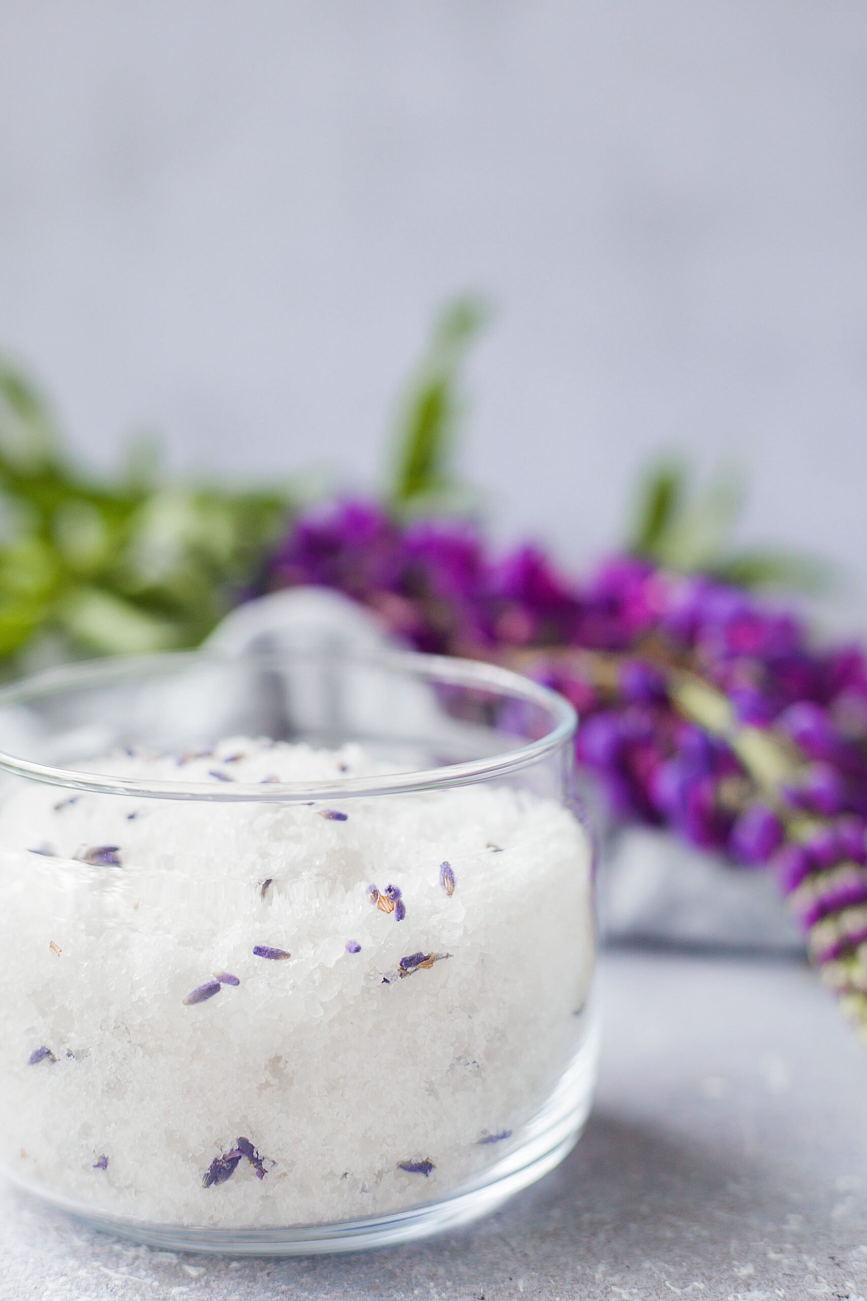 Learn how to make a DIY lavender salt scrub with this easy recipe using natural ingredients. Exfoliate, moisturize, and relax with this soothing homemade skincare essential!