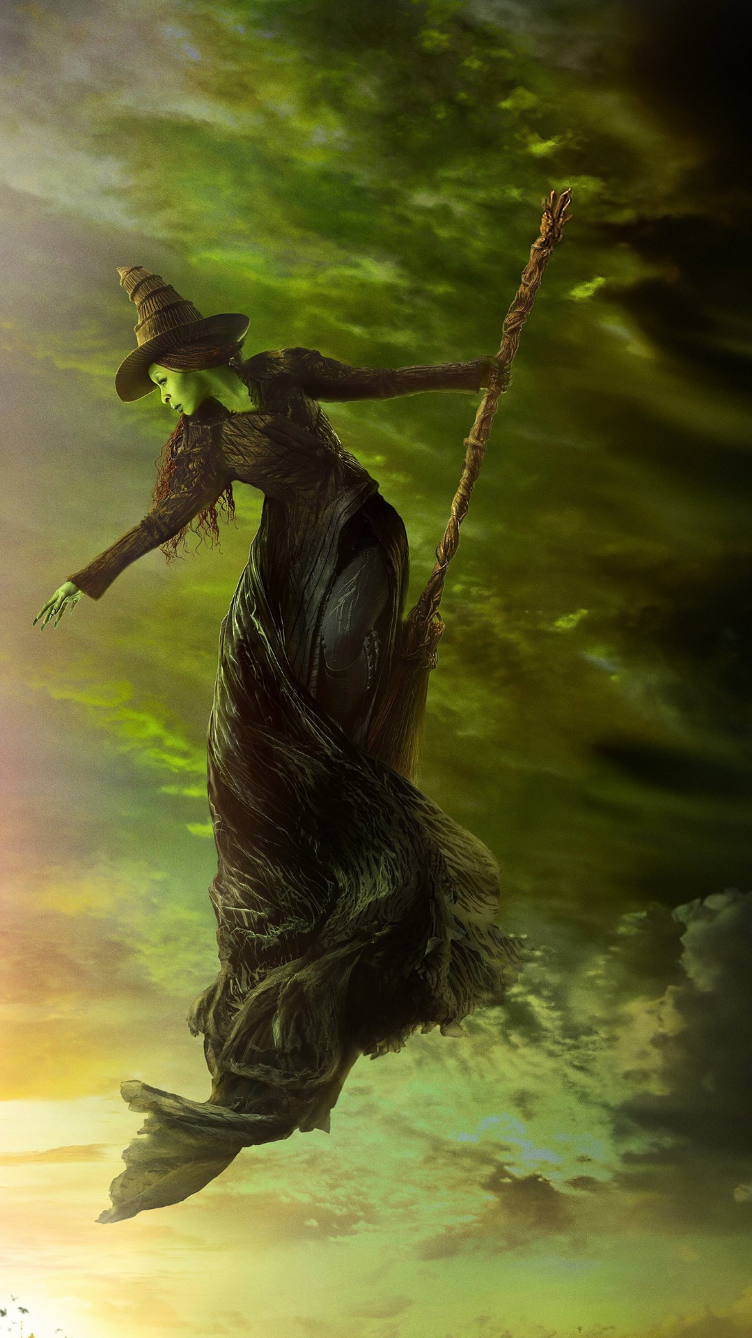 Dramatic image of Elphaba flying through a green, stormy sky on her broom, capturing the power and defiance of the Wicked Witch.