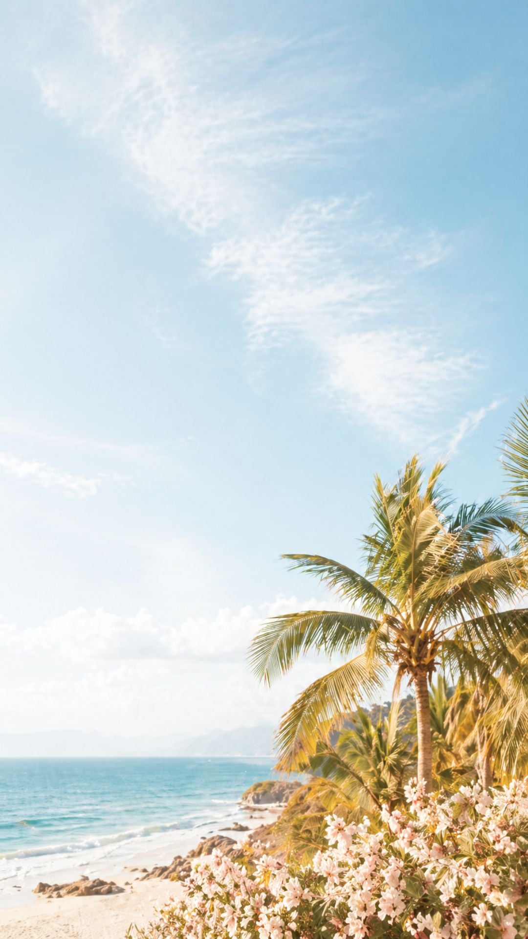 Tropical summer iPhone wallpaper with palm trees, blue sky, ocean waves, and soft beach flowers