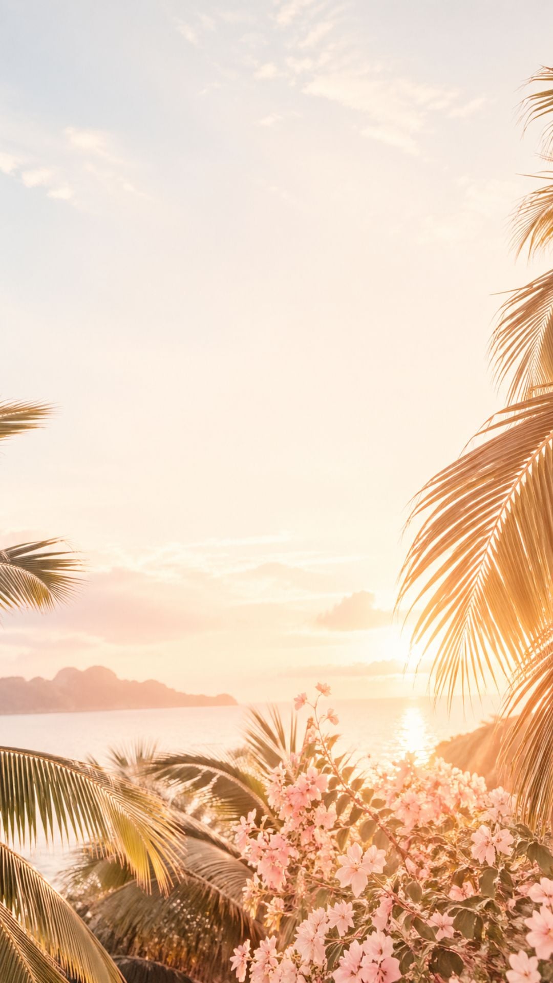 Tropical summer iPhone wallpaper with palm leaves, pink flowers, ocean sunset, and warm golden light