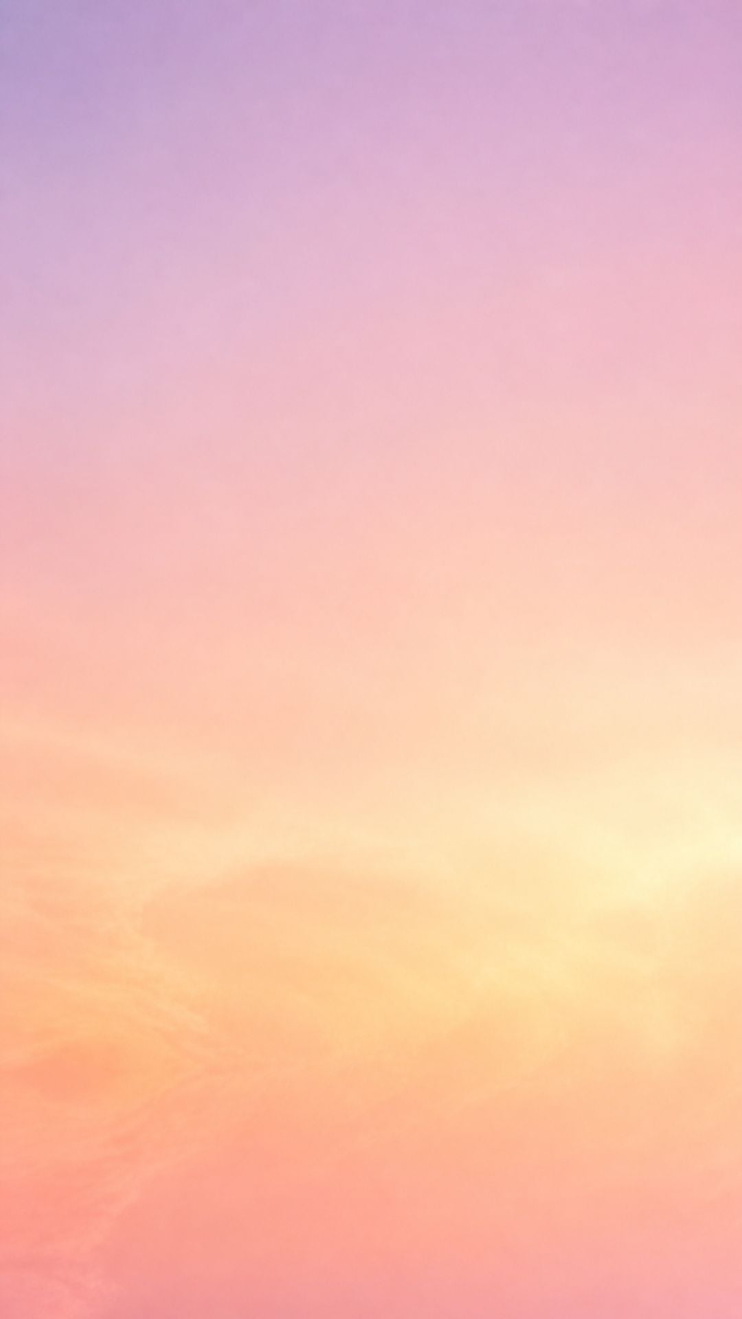 Aesthetic minimalist summer wallpaper with soft peach, yellow, and lavender sunset gradient