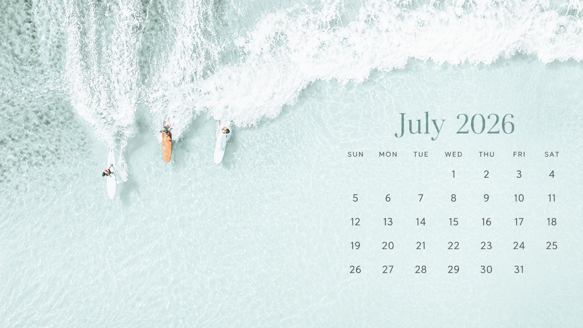 July 2026 Desktop Calendar Backgrounds with an aerial ocean view, surfers, turquoise water, and a clean coastal calendar layout.