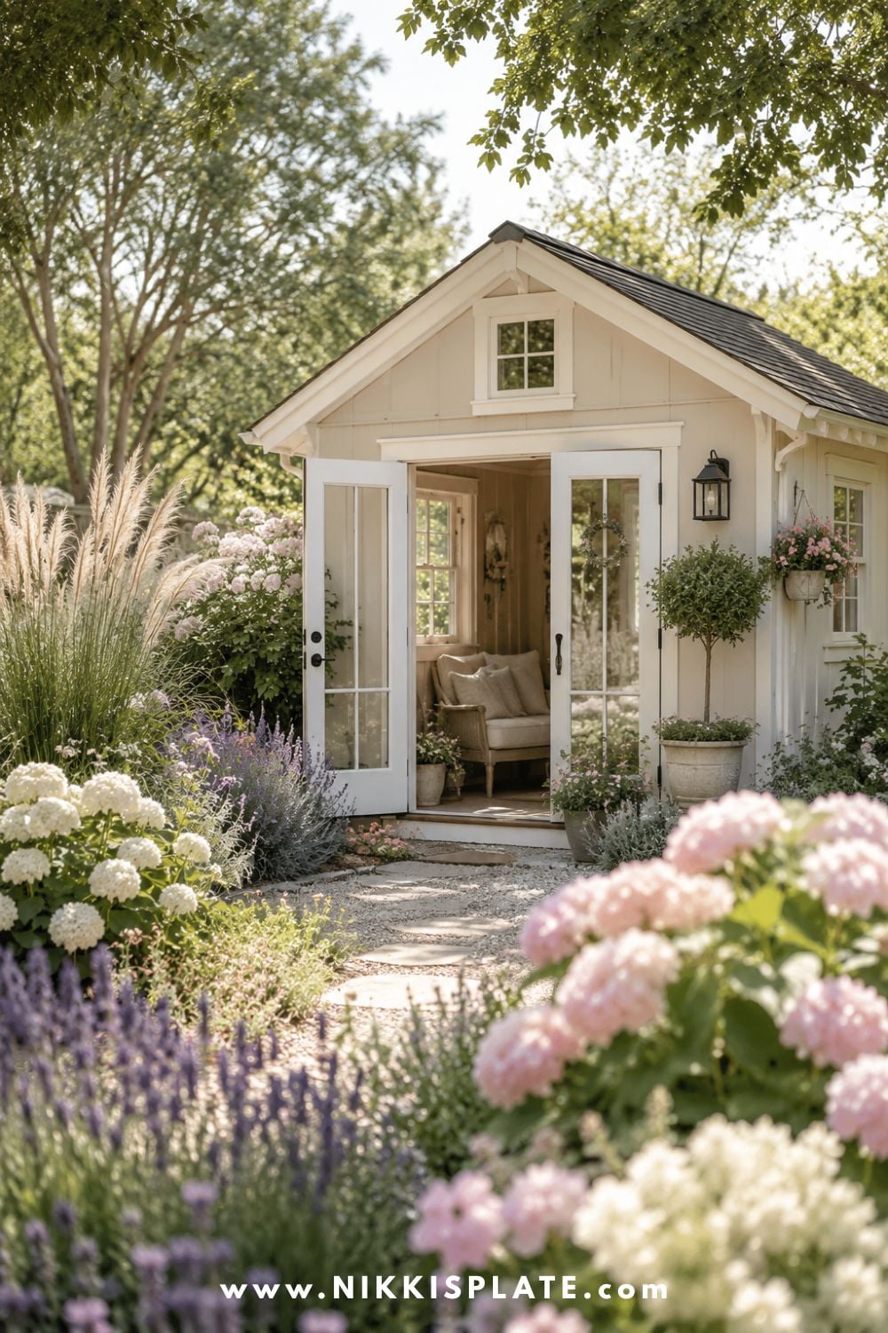 Shed landscaping ideas with hydrangeas, lavender, ornamental grasses, shrubs, and a neutral she shed