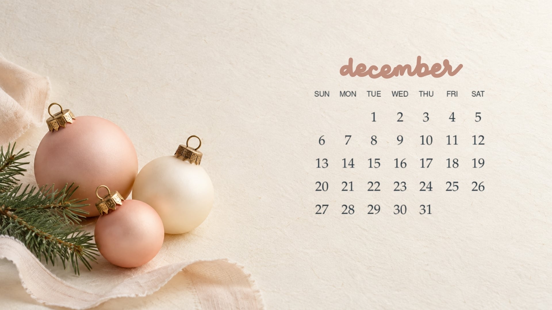 December 2026 desktop calendar with blush and ivory Christmas baubles on textured cream paper.