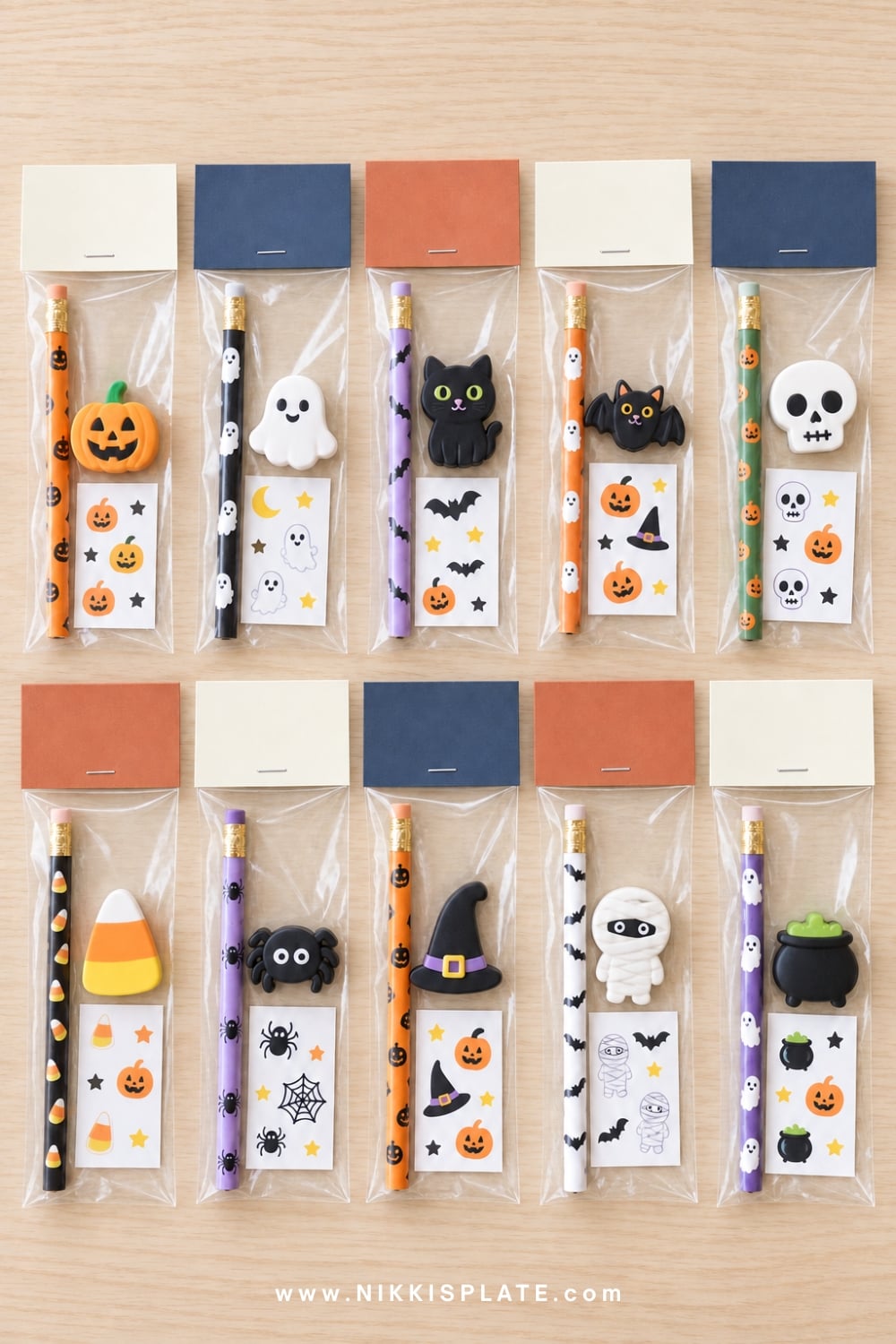 classroom halloween gift bag with pencil and sticker in clear bags.