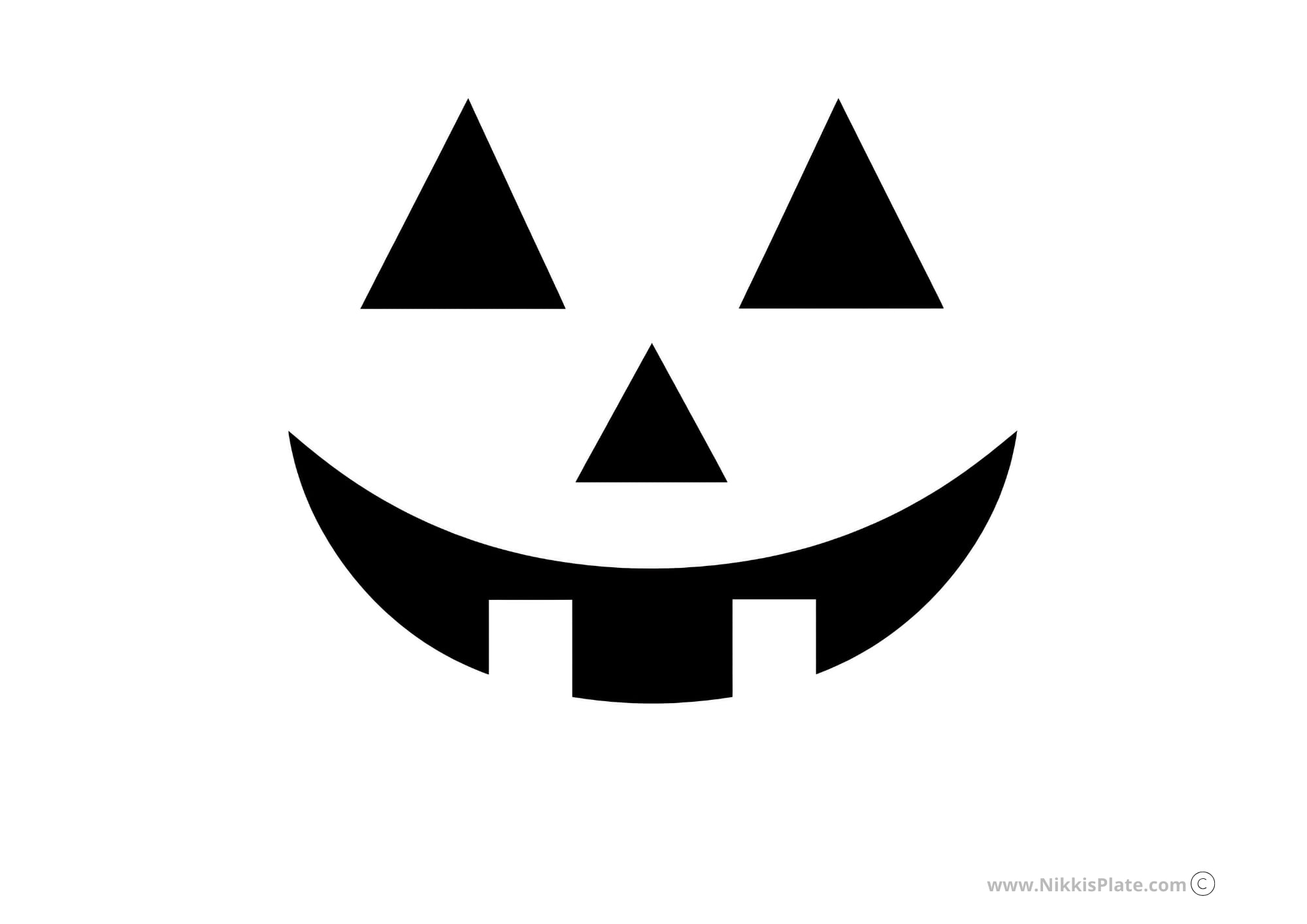 Easy smiling jack-o'-lantern pumpkin carving stencil for kids.