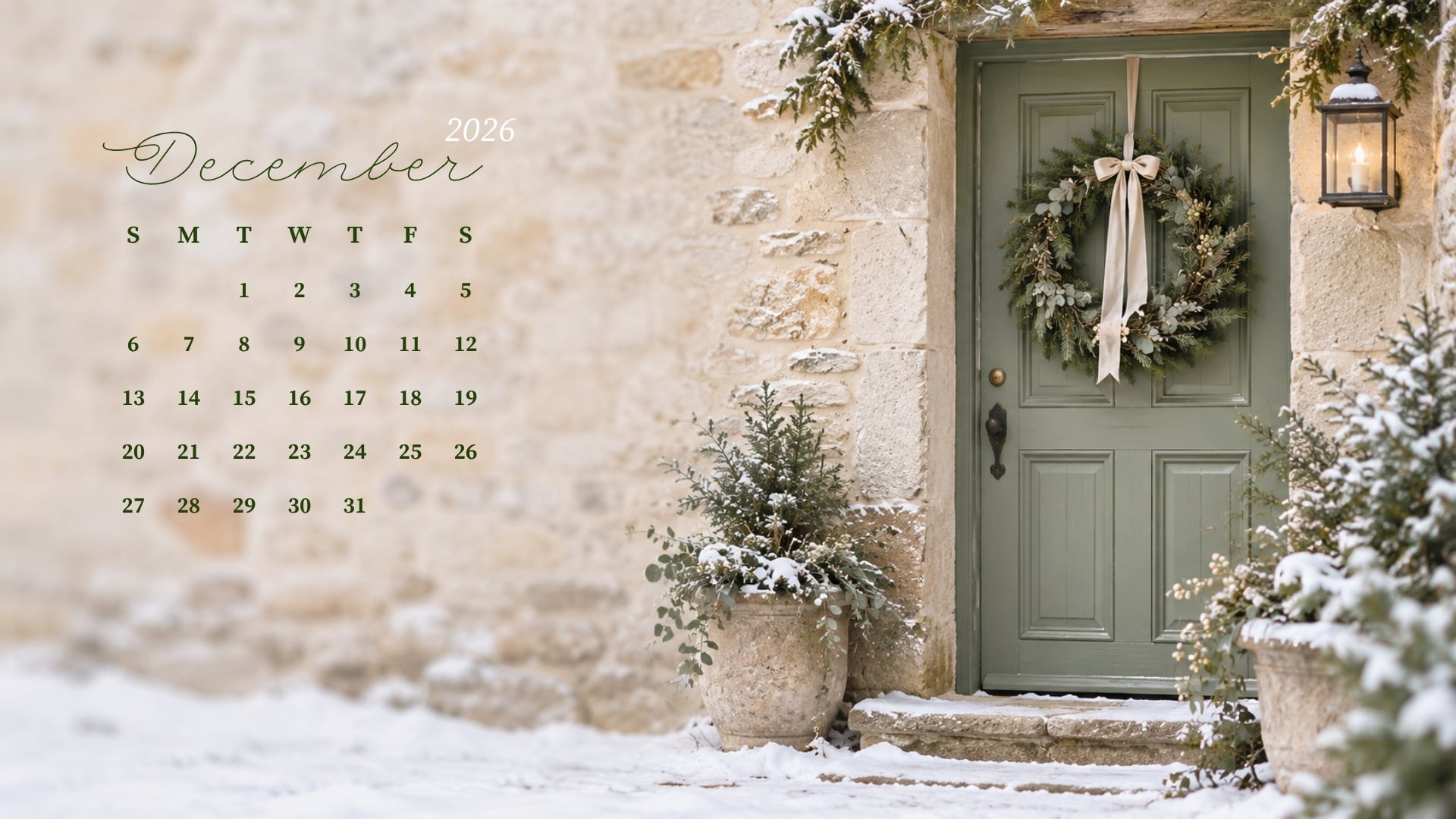 December 2026 desktop calendar with an evergreen wreath on a sage cottage door and snow on the threshold.
