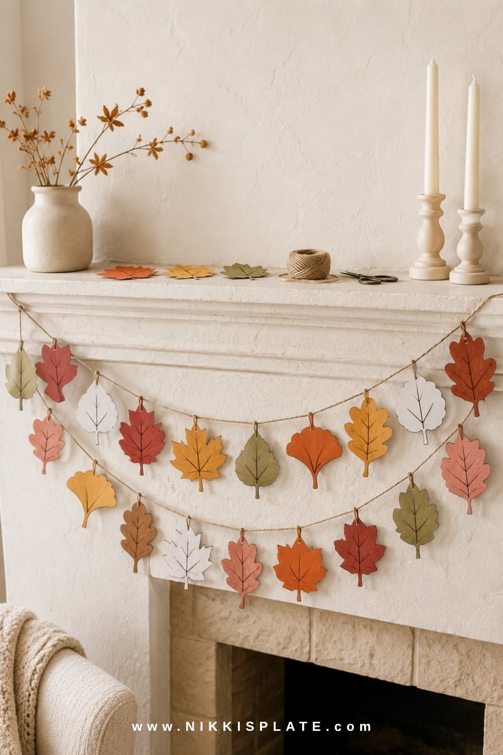 Paper fall leaf garland made with free printable leaf templates.
