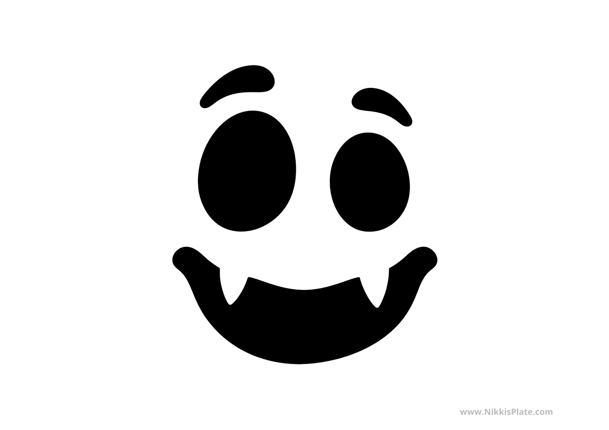 Friendly monster face pumpkin carving stencil with a silly fanged smile.