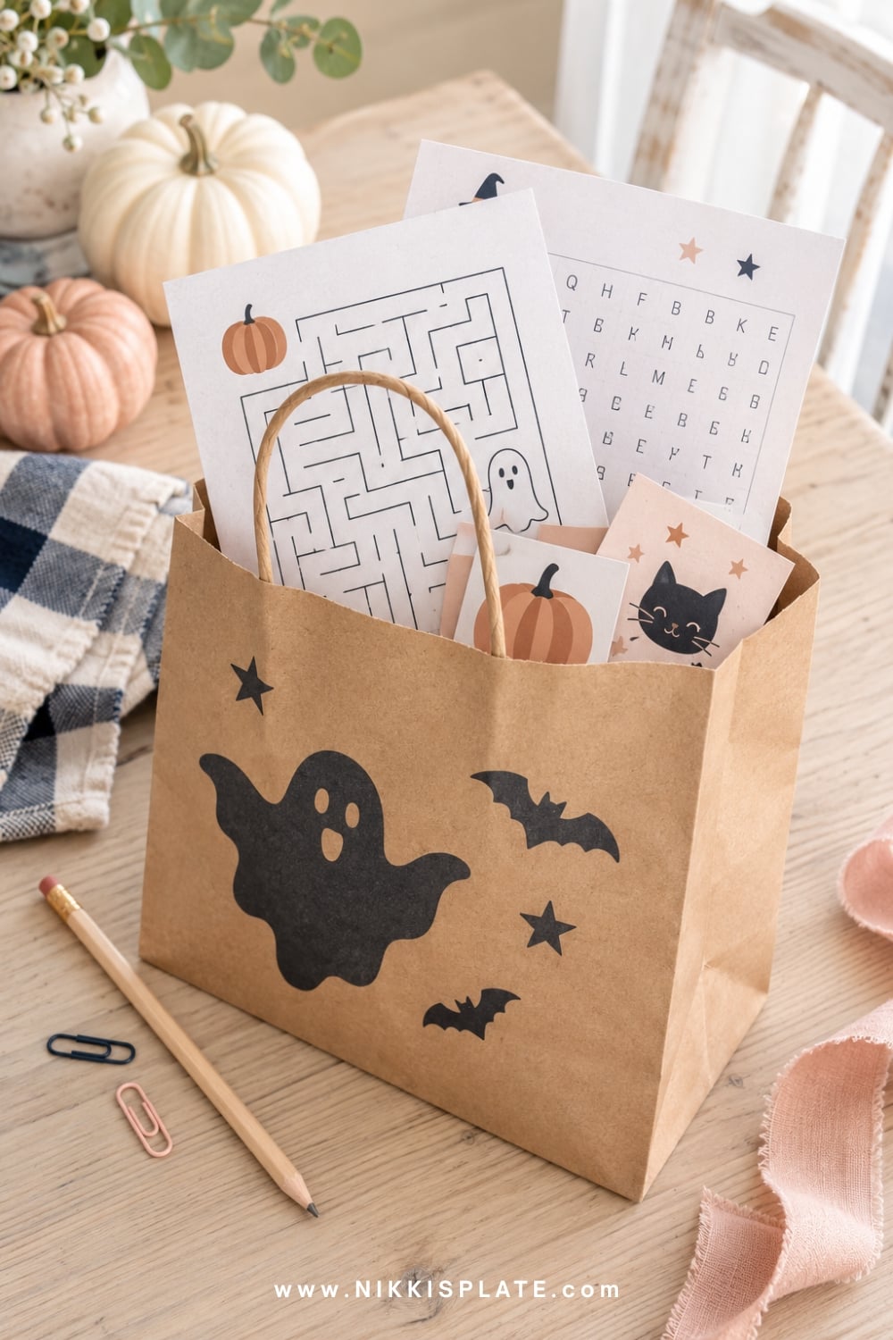 Halloween activity bags with a pencil, maze, matching game and word search.