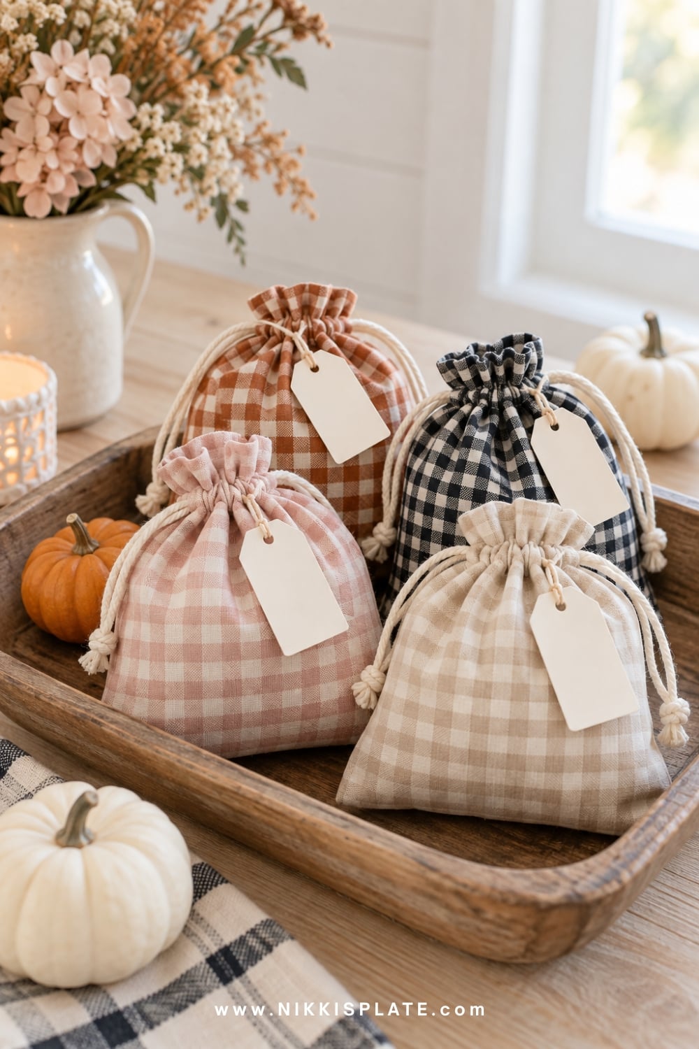 Blush, rust and black gingham drawstring Halloween treat bags.