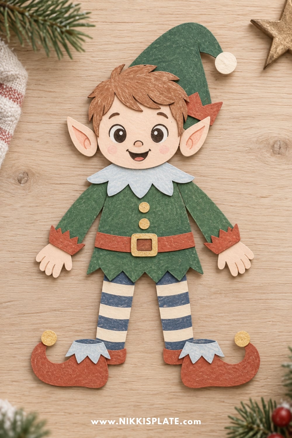 Finished printable Christmas elf craft for kids made with colored cut-and-glue pieces