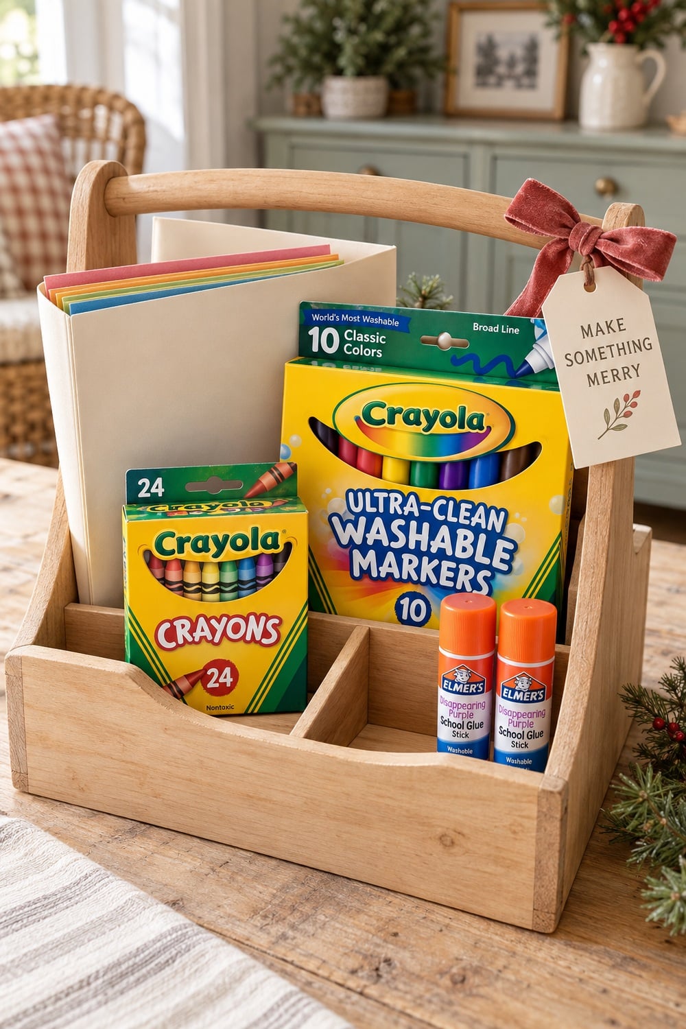 kids-christmas-craft-colouring-gift-basket.jpg Wooden Christmas art caddy with Crayola crayons and washable markers, Elmer's glue sticks, and coloured paper.