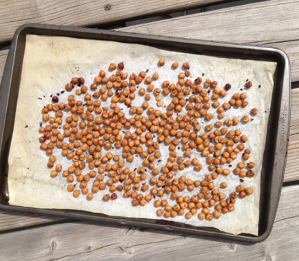 Baking pan with brown Spicy Oven Roasted Chickpeas || Nikki's Plate