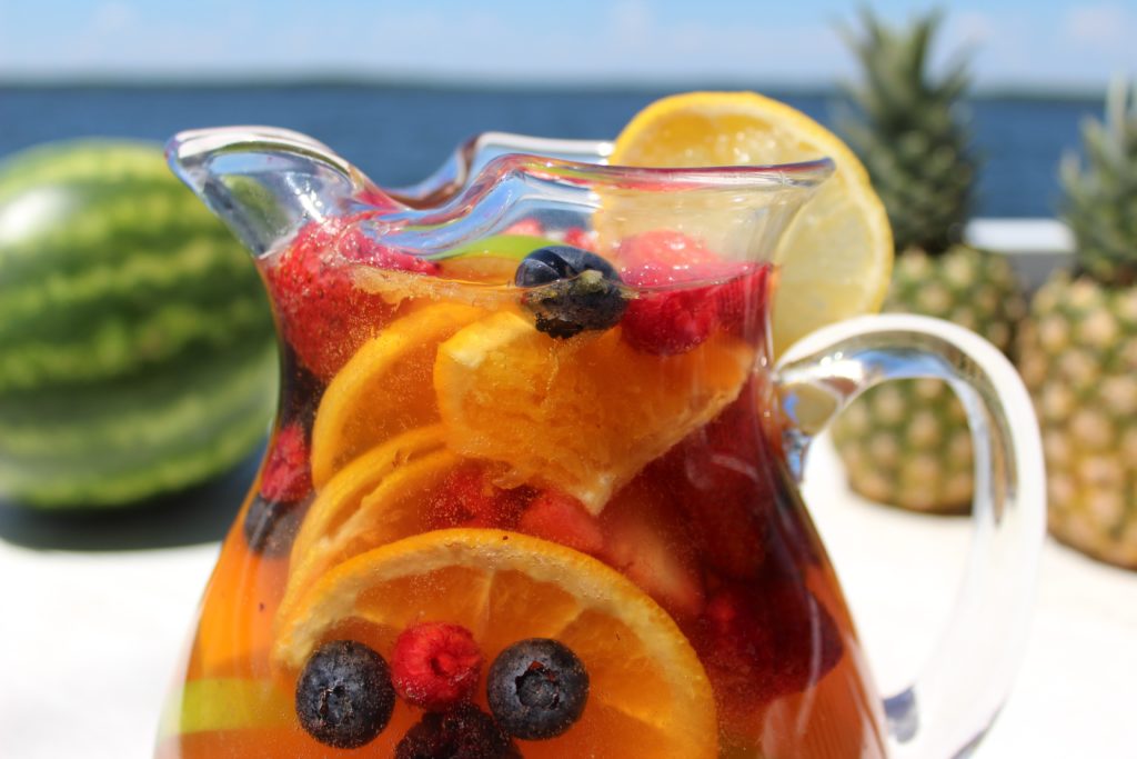 Jungle juice sangria recipe is light and refreshing, packed with fresh fruit like strawberries, oranges, blueberries, and more!