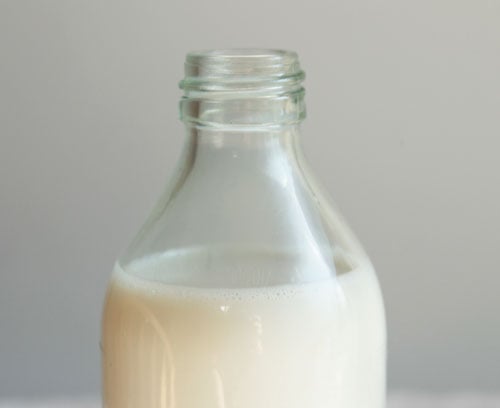 Bottle of homemade pumpkin spice almond milk. Vegan, gluten free, dairy free