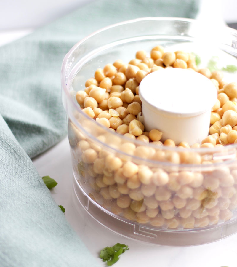 Chickpeas in a food processor for a hummus recipe
