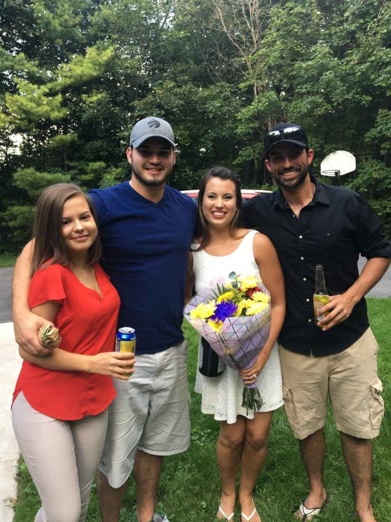 Nikki and Dylan at their engagement party with Nikki's brother and his girlfriend