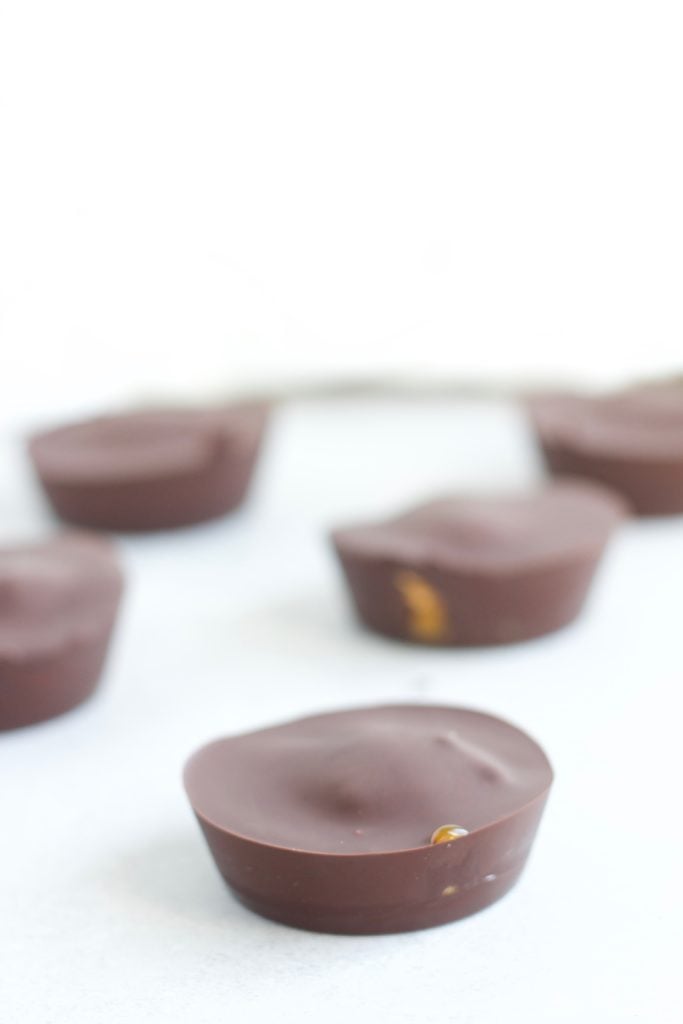 These pumpkin peanut butter cups; are bursting with peanut butter and pumpkin puree flavours. A great fall healthy treat to kick your dessert craving to the curb. Vegan and Gluten free!  || Nikki's Plate