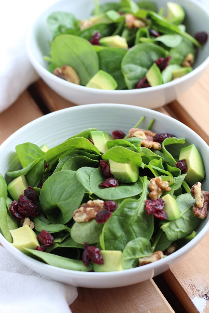 Make this delicious cranberry walnut salad for lunch and top it with a homemade honey ginger dressing