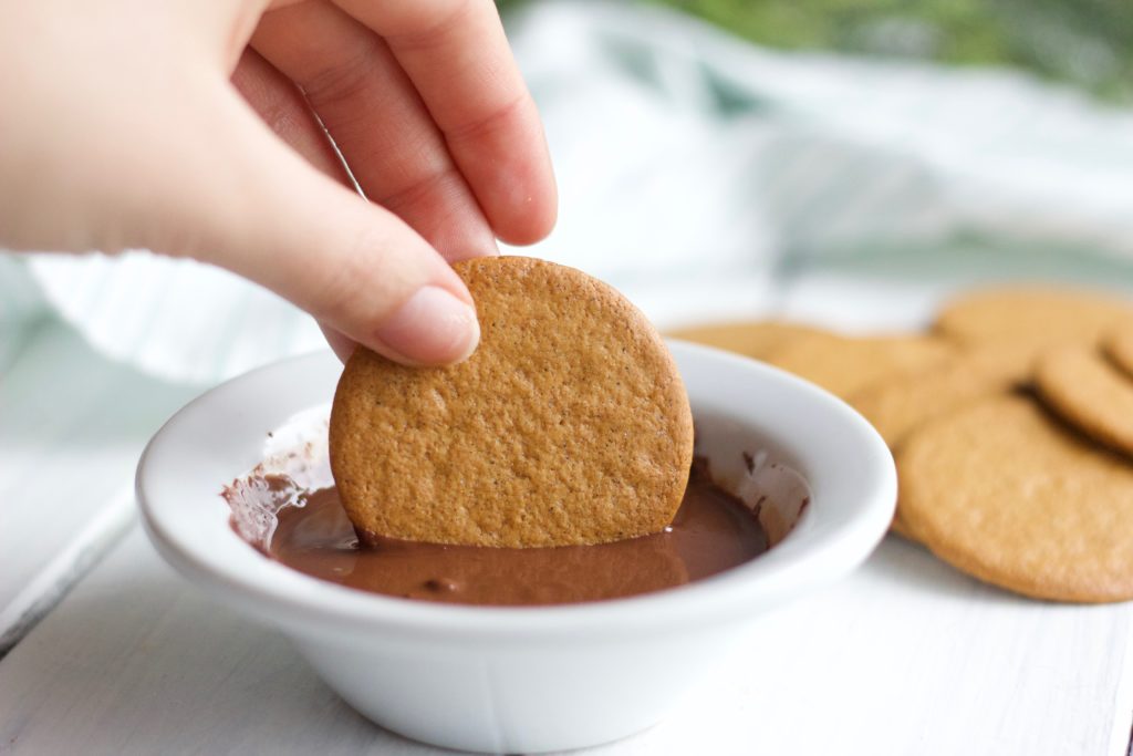 Gluten Free Chocolate Dipped Gingersnaps || dipping round gluten free gingersnap cookies into melted dark chocolate || Nikki's Plate by Nikki Bahan