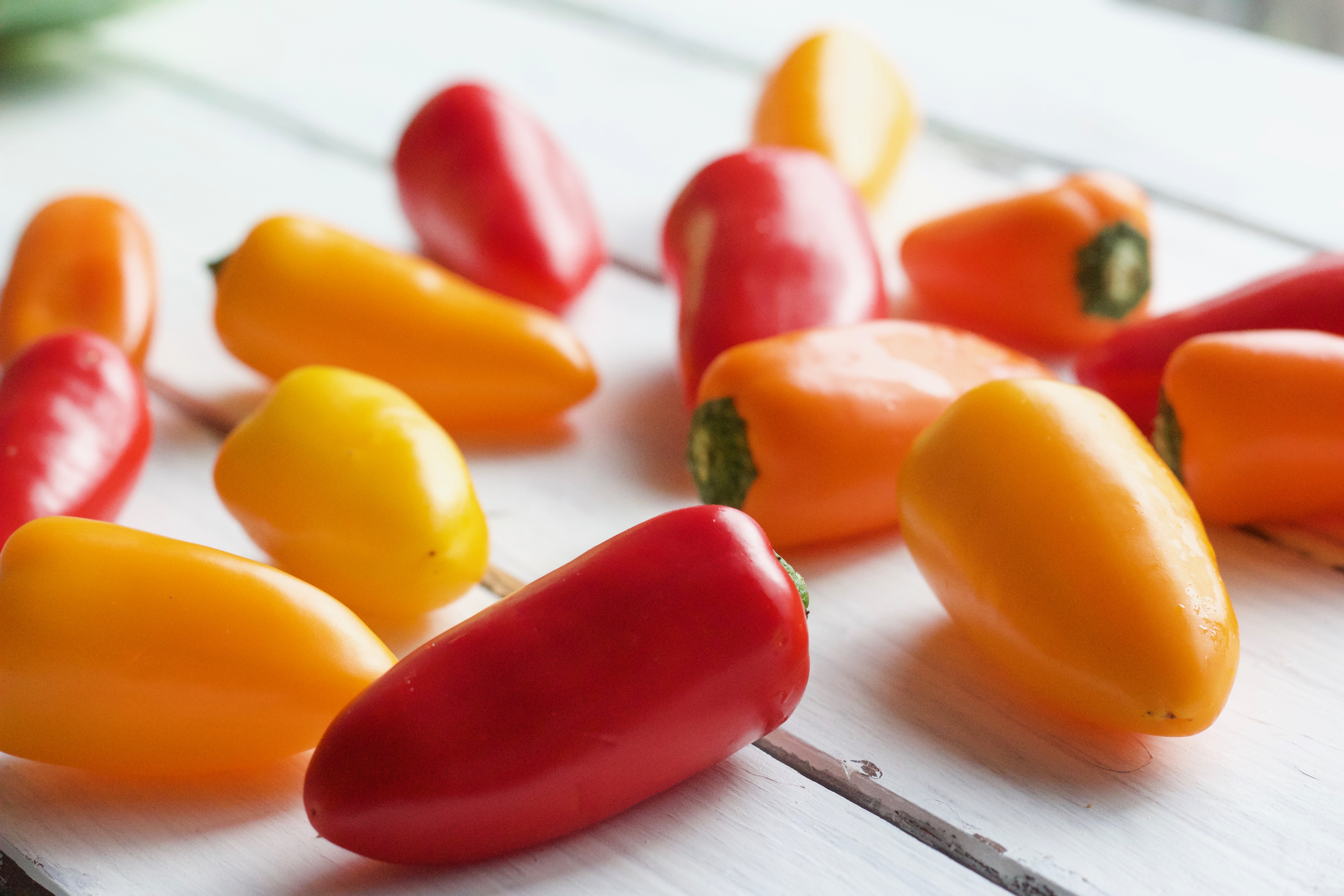 Photo of orange, yellow and red Tribelli Peppers for this creamy cauliflower bake recipe