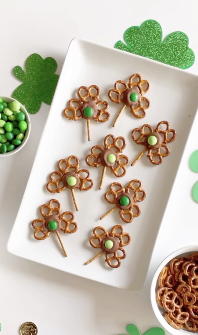 Healthy St Patrick's Day pretzel shamrock bites made with pretzels, chocolate, and green candy
