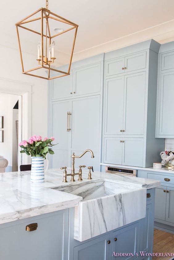 This modern and colorful kitchen is blended with farmhouse, country style. It's a purely inspiring way to cure a creative block for interior design!