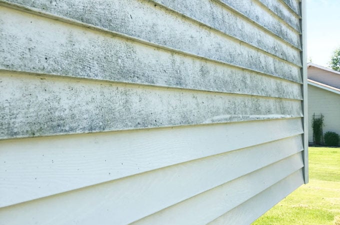 How To Clean Vinyl Siding; removing gross dirt from your house siding. Make your home exterior look fresh and new again!