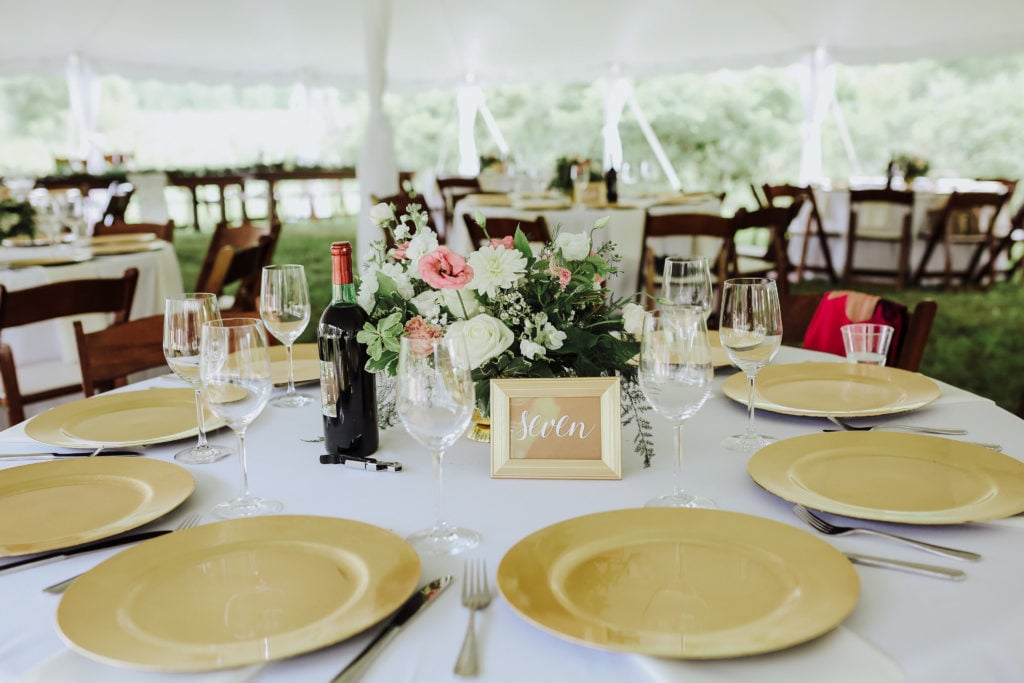 My Wedding Decor; Our outdoor wedding decor, greenery, ivory and blush florals, gold accents, rustic woods and a large barn! Rustic chic wedding reception outside! - www.nikkisplate.com