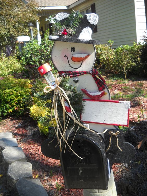 This Christmas mailbox has a gorgeous wooden snowman decked out for the Christmas season