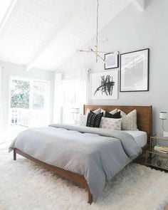 This cozy neutral master bedroom is so welcoming and warm. I love the area run, which gives the room a bit of texture